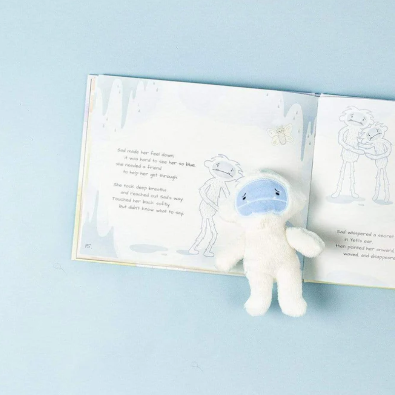 The Feels book with stuffed animal