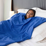 Wipe-Clean Weighted Blanket young girl on bed